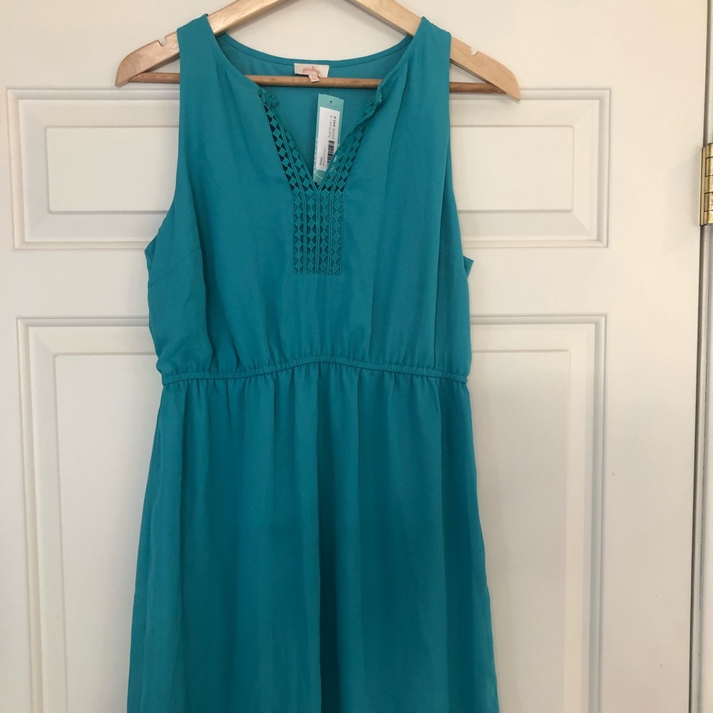 New dress never worn with pockets!